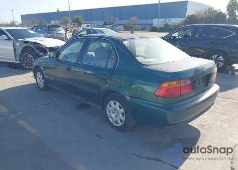 1999 Honda Civic Lx z USA, uszkodzony, nr VIN 2HGEJ6576XH563668